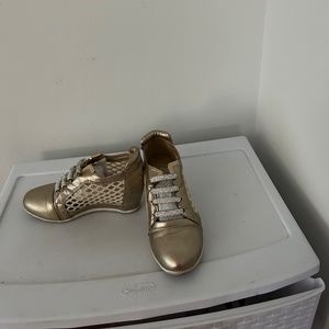 Gold high top sneakers